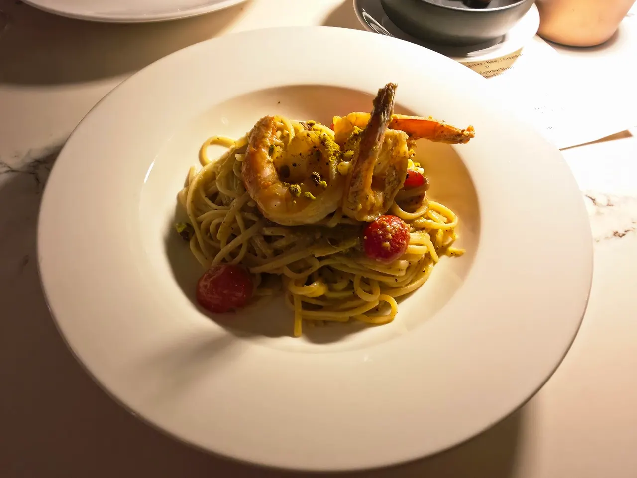 Seafood linguine with grilled prawns and cherry tomatoes at Zitto Zitto Taverna
