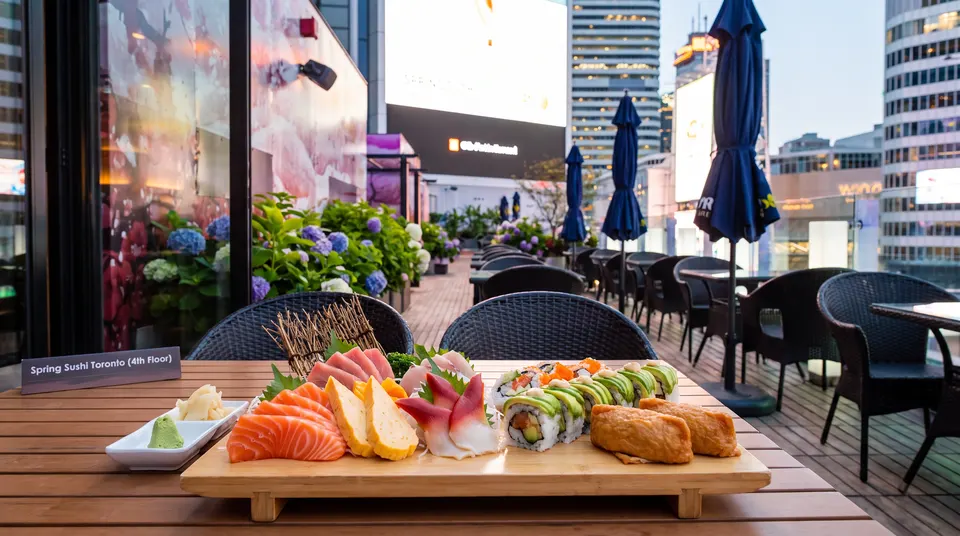 Fresh sushi platter served on the outdoor rooftop patio at Spring Sushi Toronto.