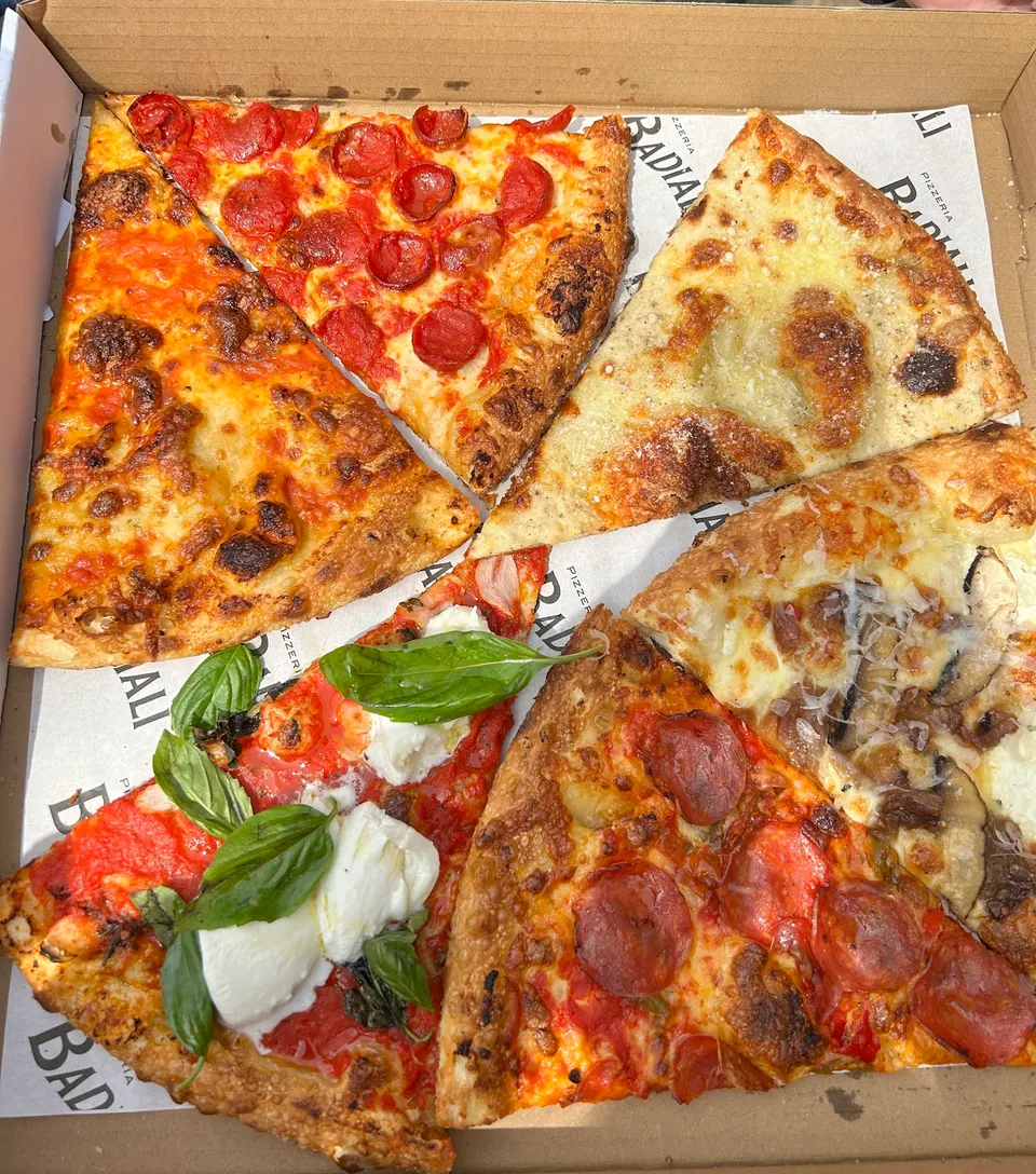A large New York-style pizza slice