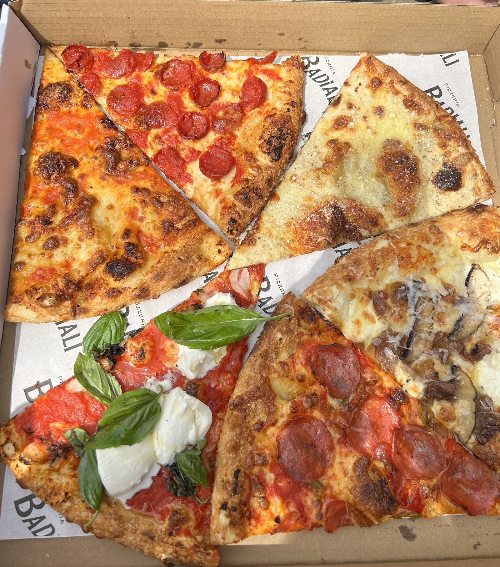 A large New York-style pizza slice