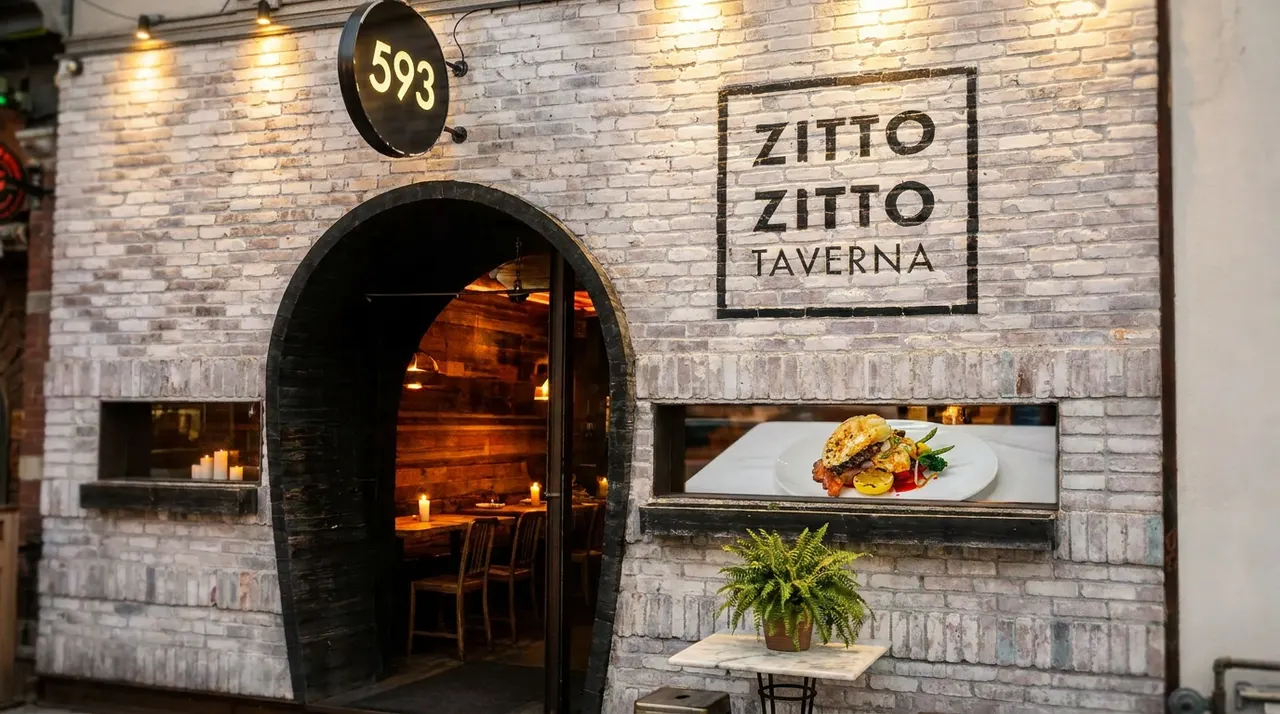 The rustic brick exterior of Zitto Zitto Taverna in Trinity-Bellwoods, featuring a large arched doorway revealing a warm wood-paneled dining room, a painted wall sign, and a small window display showing a plated dish.